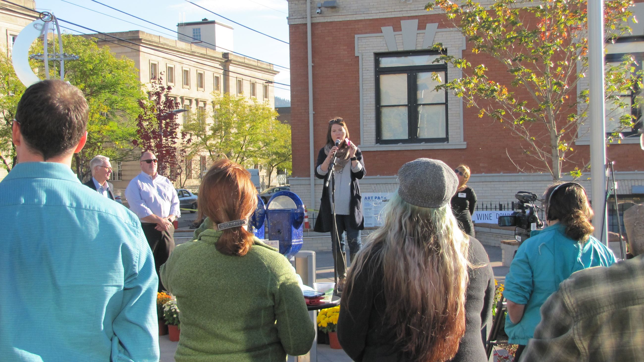 Allison Mouch speaking to the crowd