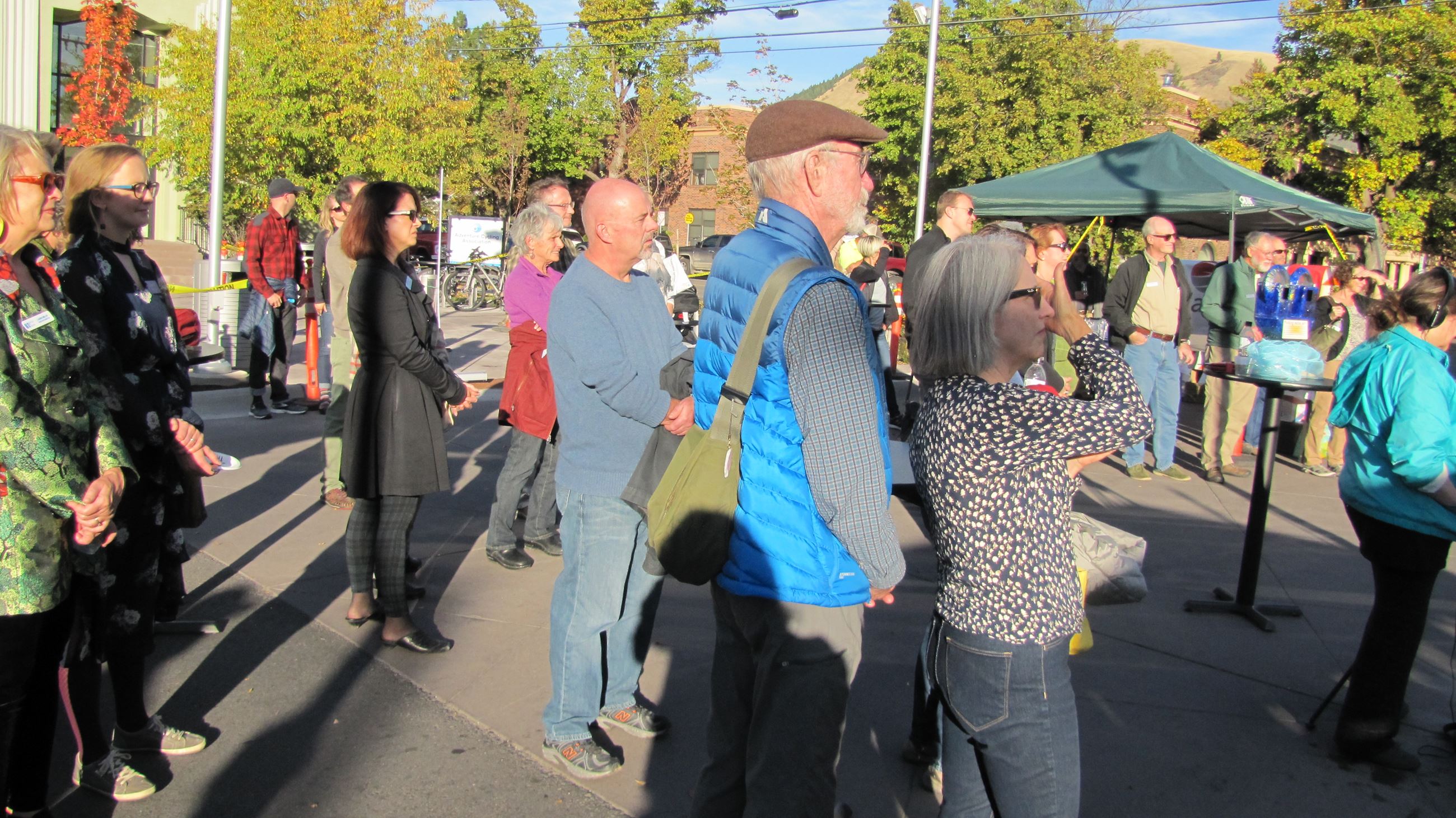 A group of people watching the award ceremony